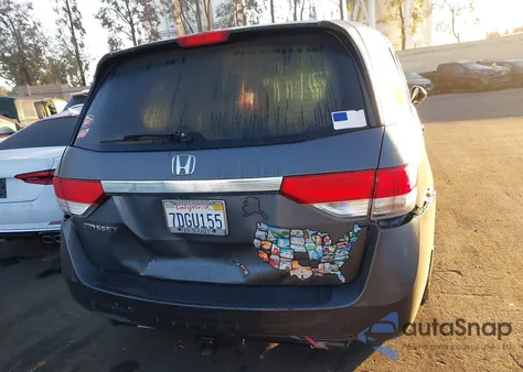 2014 Honda Odyssey Lx z USA, uszkodzony, nr VIN 5FNRL5H26EB047155